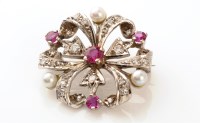 Lot 680 - A ruby, diamond and cultured pearl brooch, of...