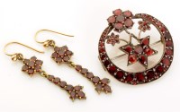 Lot 684 - A 19th Century garnet set crescent brooch,...