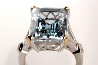 Lot 705 - An aquamarine and diamond ring, the emerald...