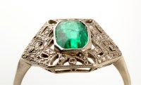 Lot 725 - An Art Deco emerald and diamond ring, the...