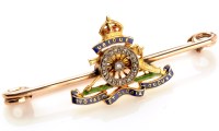 Lot 734 - A gold, enamel and diamond Royal Artillery...