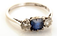 Lot 736 - A sapphire and diamond ring, the square cut...