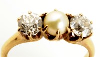 Lot 740 - A cultured pearl and diamond ring, the central...