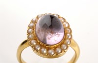 Lot 744 - An amethyst and cultured pearl cluster ring,...