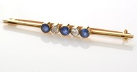 Lot 745 - A sapphire and diamond bar brooch, the three...