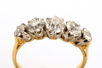 Lot 753 - A five stone diamond ring, each of the old cut...