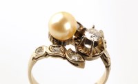 Lot 776 - A French diamond and cultured pearl ring, the...