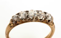 Lot 779 - A five stone diamond ring, the old cut...