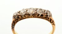 Lot 786 - A five stone diamond ring, the tapering old...