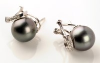 Lot 806 - A pair of black cultured pearl and diamond...