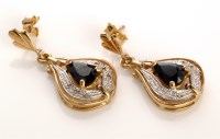 Lot 814 - A pair of sapphire and diamond earrings, the...