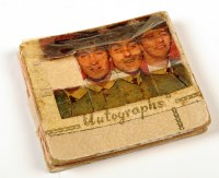 Lot 913 - An autograph album containing all four...