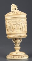 Lot 987 - A European carved ivory covered box-on-stand,...