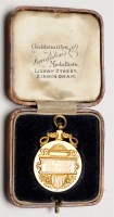 Lot 1004 - An 18ct. yellow gold football medal for the...