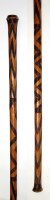 Lot 1010 - A tribal carved wooden staff, possibly...