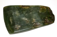 Lot 1014 - A green stone axe head, probably Nephrite from...