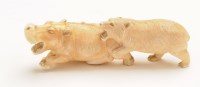 Lot 1031 - An early 20th Century carved ivory group...