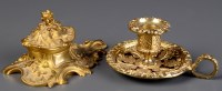 Lot 1050 - A gilt metal rococo revival inkwell, the cover...