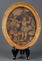 Lot 1056 - An early 19th Century tapestry fragment...