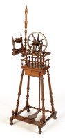 Lot 1057 - An 18th Century treen spinning wheel, by John...