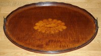 Lot 1059 - An Edwardian mahogany tray, oval with central...