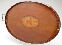 Lot 1069 - An Edwardian mahogany oval tray, the centre...