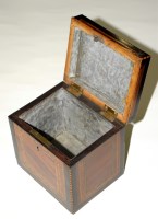 Lot 1071 - A specimen wood tea caddy, each side with...