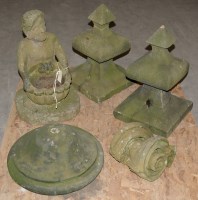 Lot 1077 - A pair of carved sandstone gatepost finials,...