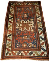 Lot 1090 - A mid 20th Century Kazak rug, of bold...