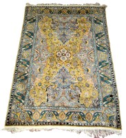 Lot 1097 - A modern Tabriz style rug, with full floral...