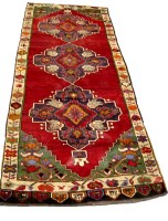 Lot 1106 - A Turkish Karapinar carpet, the three floral...