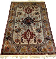 Lot 1109 - A mid 20th Century Kazak style rug, with bold...