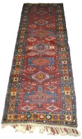 Lot 1111 - A Persian Karafa runner, decorated in...