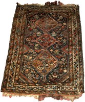 Lot 1113 - A south west Persian Kashgai rug, with triple...