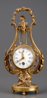 Lot 1120 - A French Louis XVI style gilt bronze lyre...