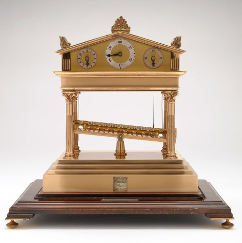 Lot 1134 - A Thwaites & Reed rolling ball clock, c. 1972,...
