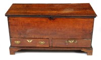 Lot 1159 - An 18th Century oak mule chest, the plank top...