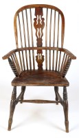 Lot 1173 - A 19th Century Windsor high back armchair,...