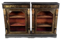 Lot 1203 - A pair of French ebonised and boulle decorated...