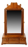 Lot 1217 - A Georgian mahogany swing frame toilet mirror,...