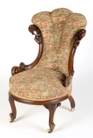 Lot 1221 - A Victorian walnut tub-shaped nursing chair,...