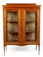 Lot 1226 - An Edwardian inlaid mahogany display cabinet,...