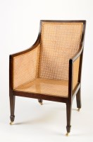 Lot 1228 - An Edwardian stained wood bergere armchair,...