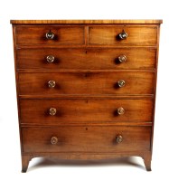 Lot 1231 - An early 19th Century mahogany chest of two...