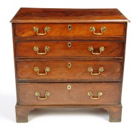 Lot 1237 - A late George III mahogany chest of four long...