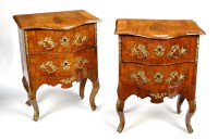 Lot 1243 - A pair of Louis XV style small size two-drawer...