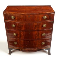 Lot 1250 - A George III mahogany bowfront chest of four...