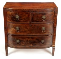 Lot 1251 - A William IV mahogany bowfront chest of two...