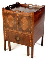 Lot 1256 - A Georgian mahogany commode, the serpentine...