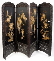 Lot 1260 - A four-fold Japanese carved hardwood screen,...